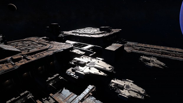 3 Destroyers docked at a Station