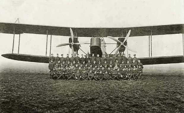 old time bomber with manning crew