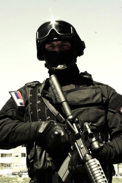 Gendarme pretending in front of camera